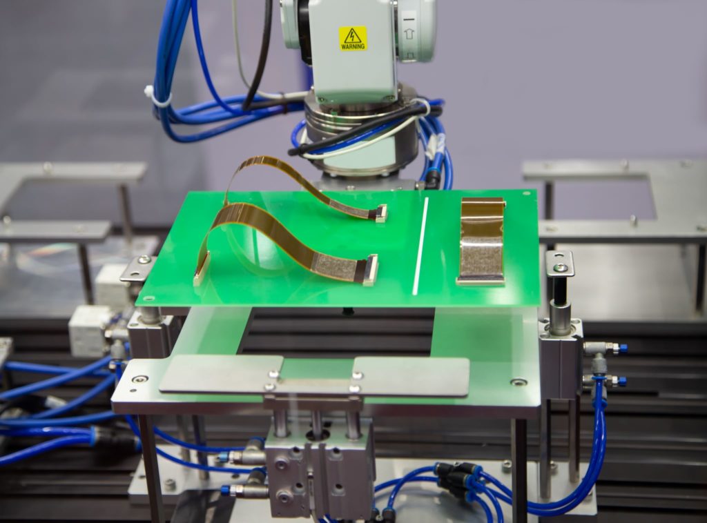Automated robot connecting flexible flat cable (FFC) on printed circuit board (PCB)