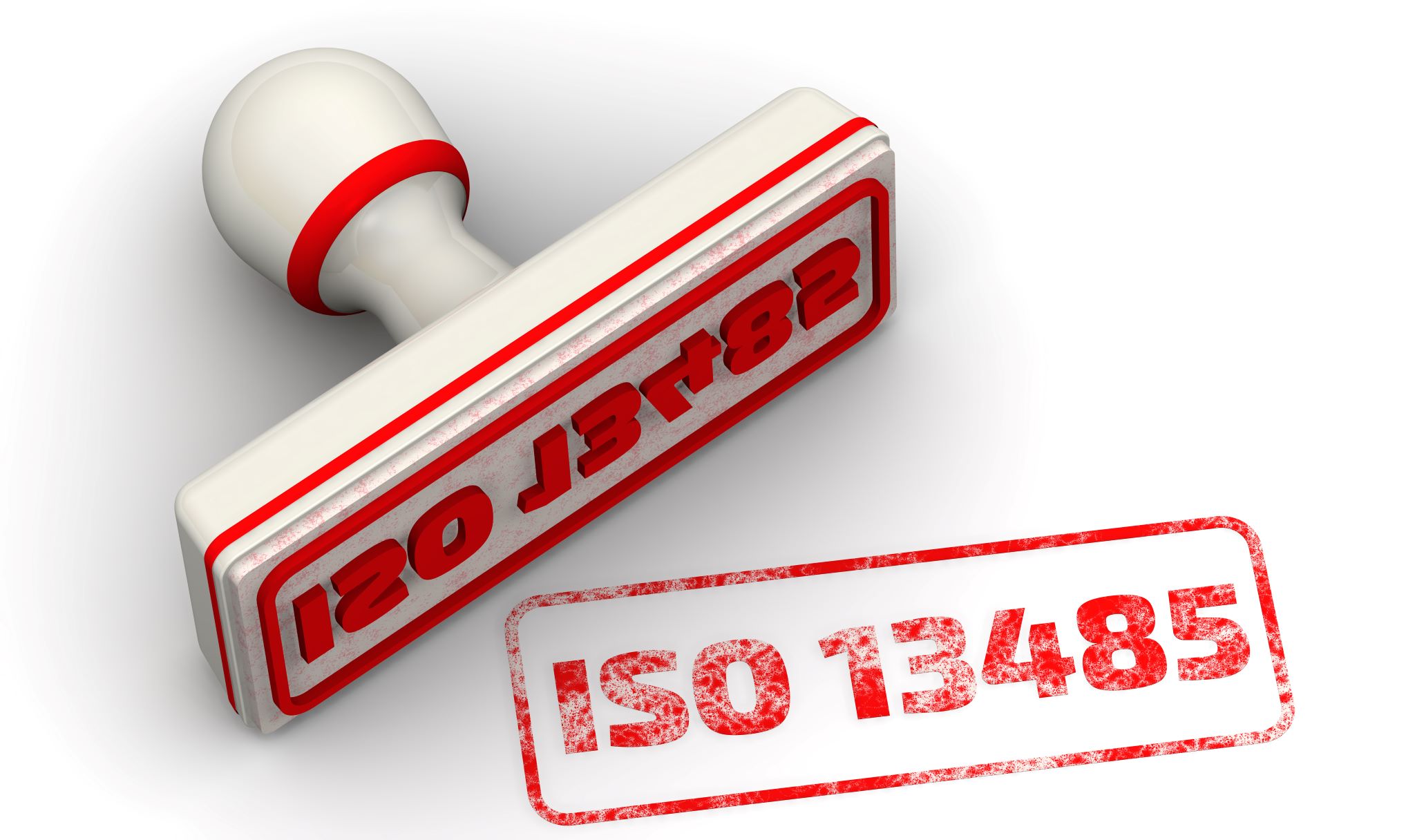 White rubber stamp with red imprint of text ISO 13485